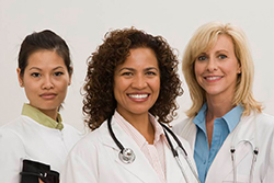 Three ethnically diverse women medical professionals