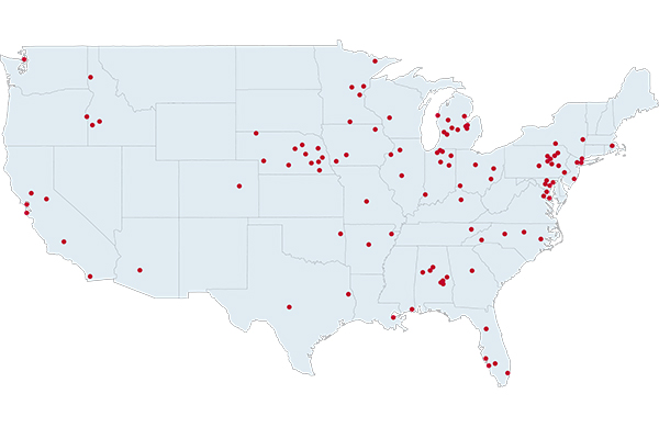 a map of the United States showing clusters of red dots that represenent TAKEheart partner hospitals.